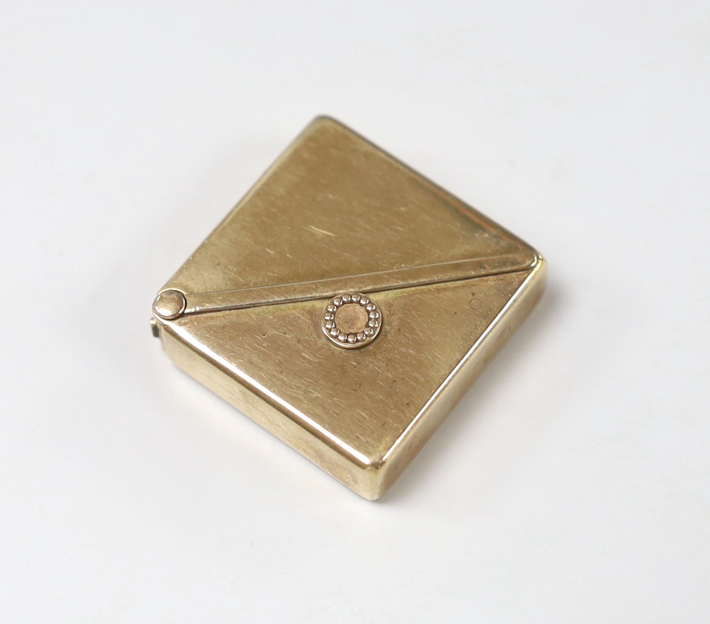 A 1930's/1940's yellow metal Eclipso square cased travelling watch, retailed by Hamilton of Calcutta, 29mm, gross weight 30.9 grams.